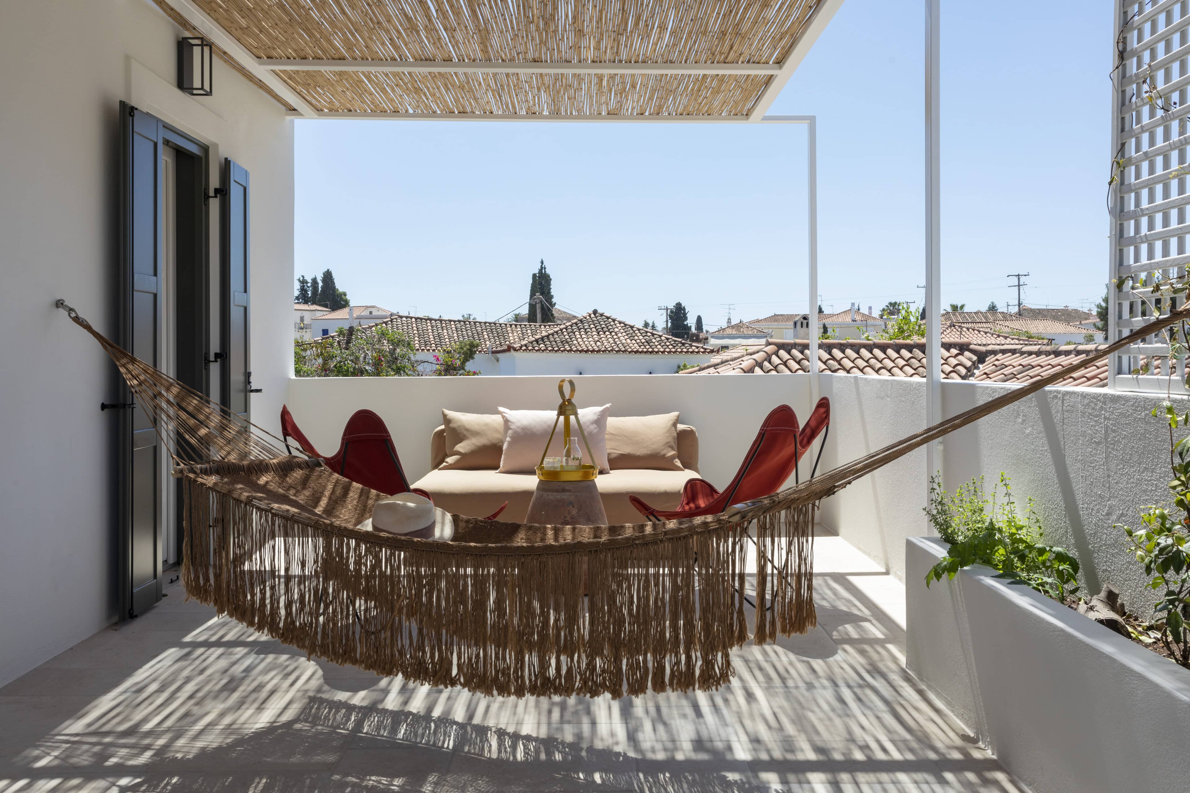 Balkon mit Hängematte des Hotel Yayaki