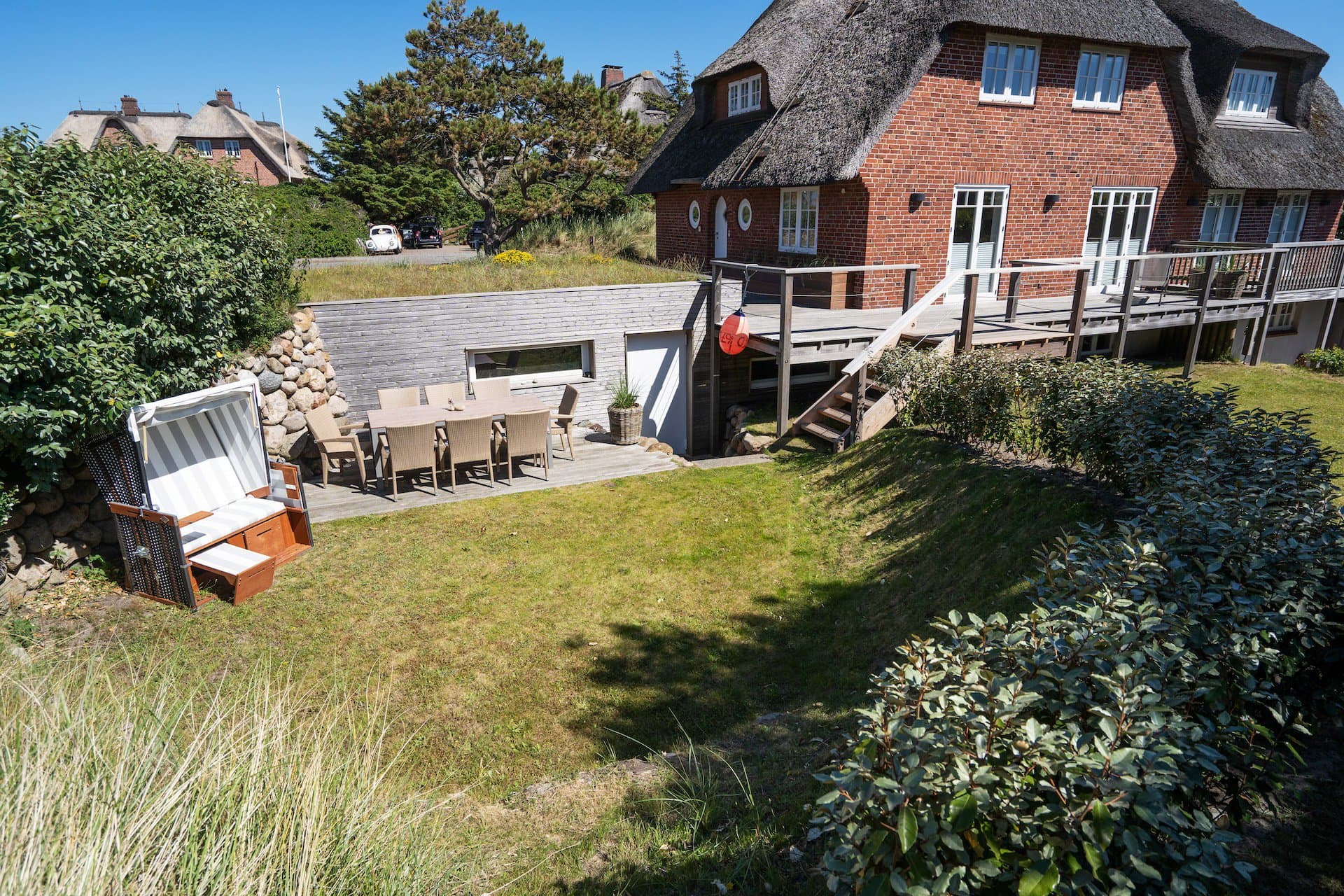 Boutique-Ferienhaus mit Reetdach auf der Nordseeinsel Sylt.
