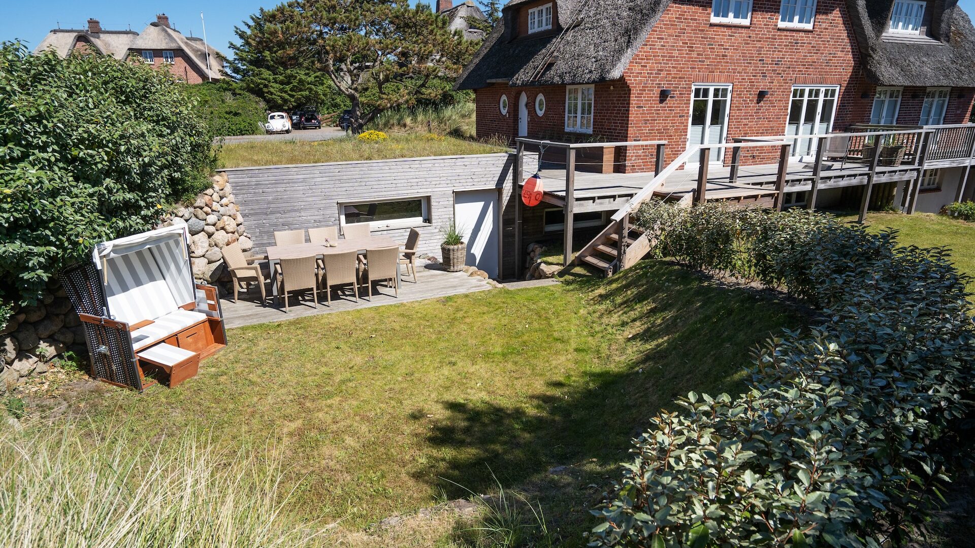 Boutique-Ferienhaus mit Reetdach auf der Nordseeinsel Sylt.