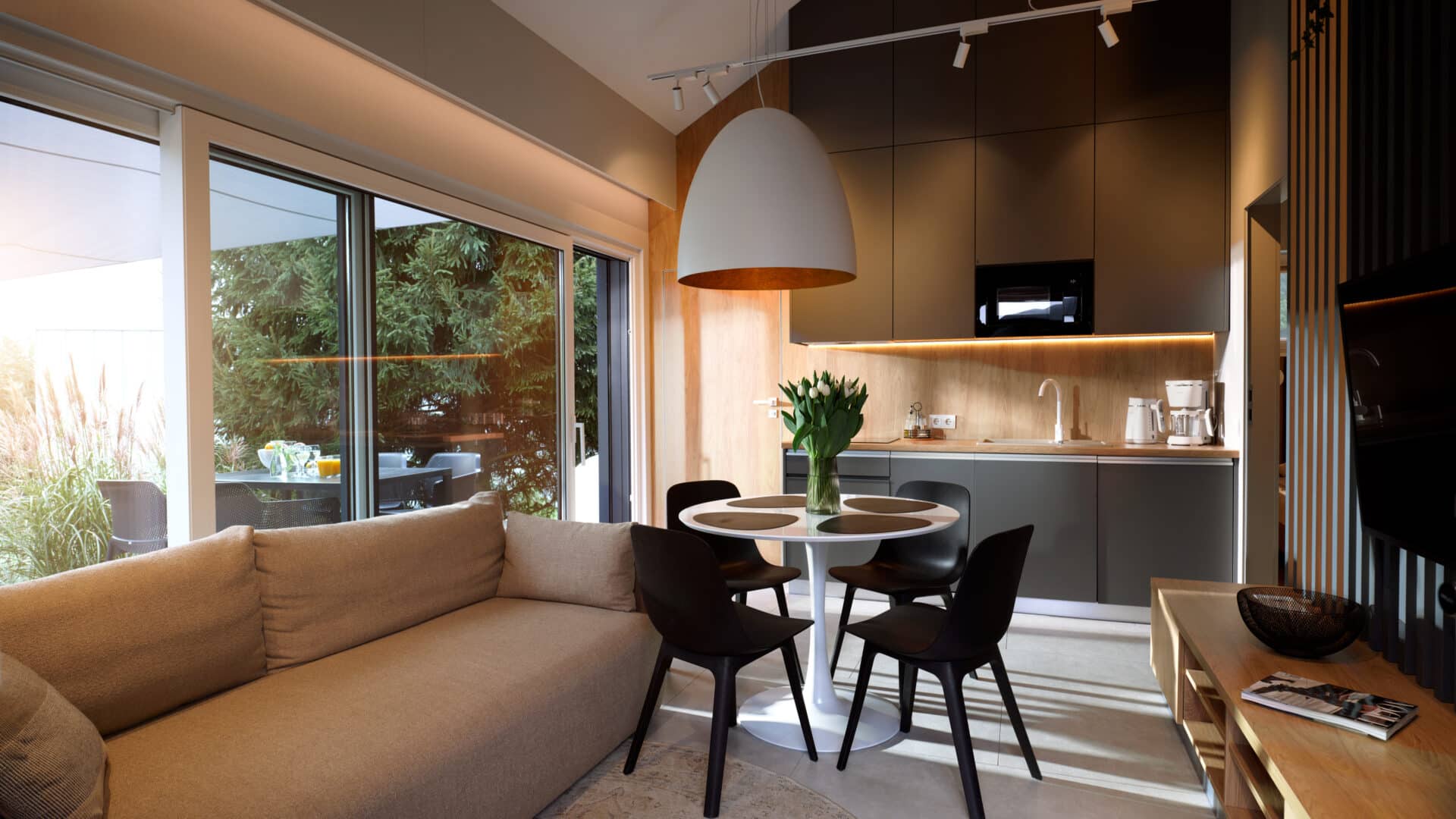 Wohn- und Esszimmer mit Sofa und Esstisch