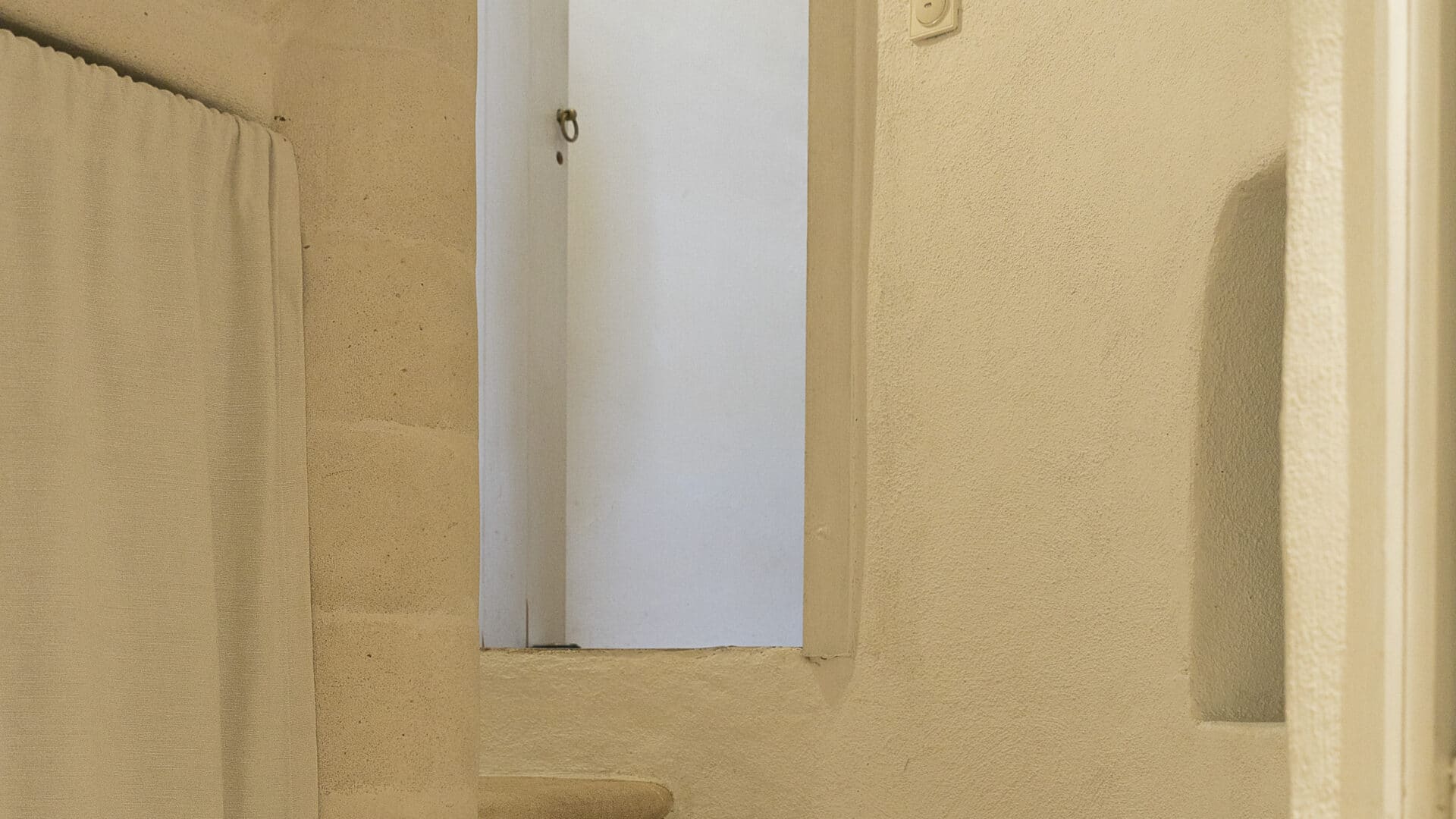 Steintreppe im Turm des Le Pigeonnier
